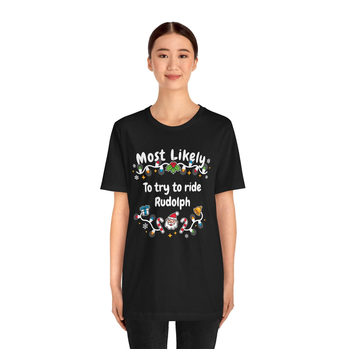 Most Likely To try To Ride Rudolph Unisex Deluxe Tee